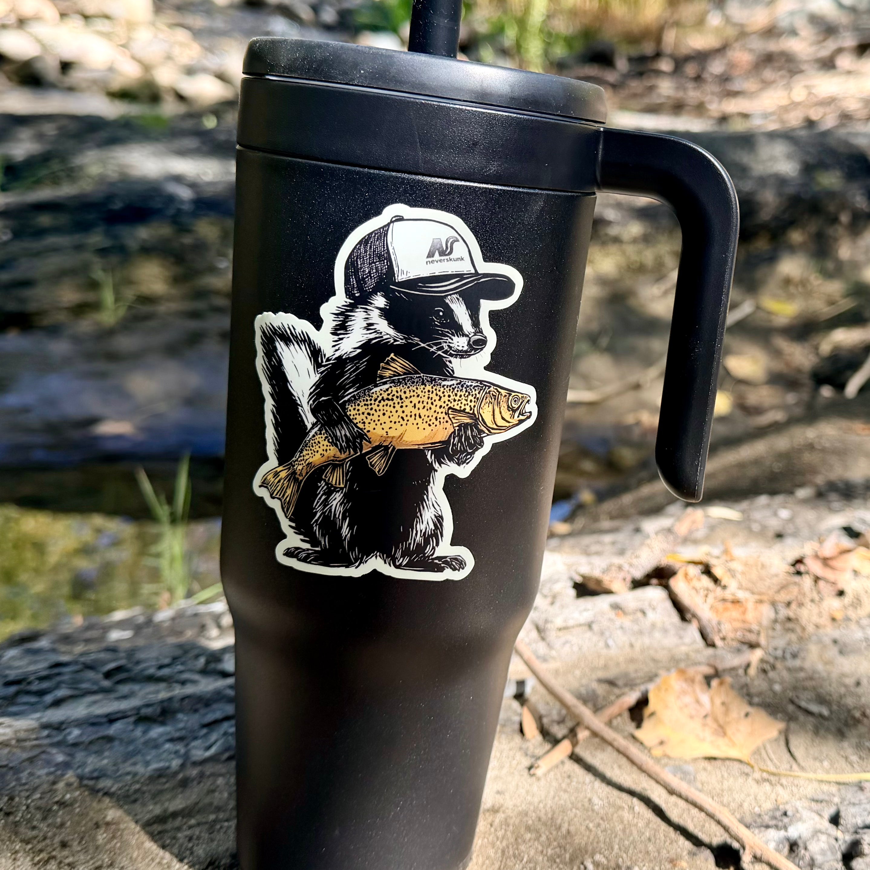 STANKY THE SKUNK WITH BROWN TROUT DIE CUT STICKER